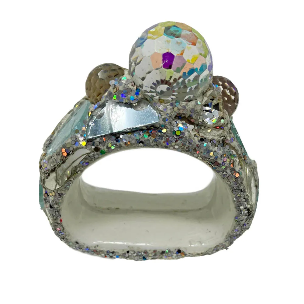 SILVER AND CRYSTAL SERVIETTE RINGS